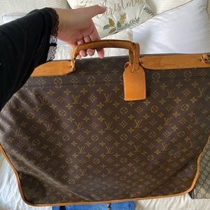 Vintage Louis Vuitton suit/dress bag